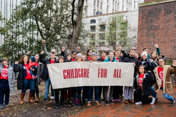 Members gather at the Bell Tower at State Capitol for Childcare For All rally 